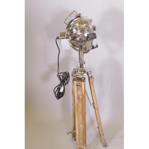 46 - A retro spot light style standard lamp on a wooden tripod base, minimum 45