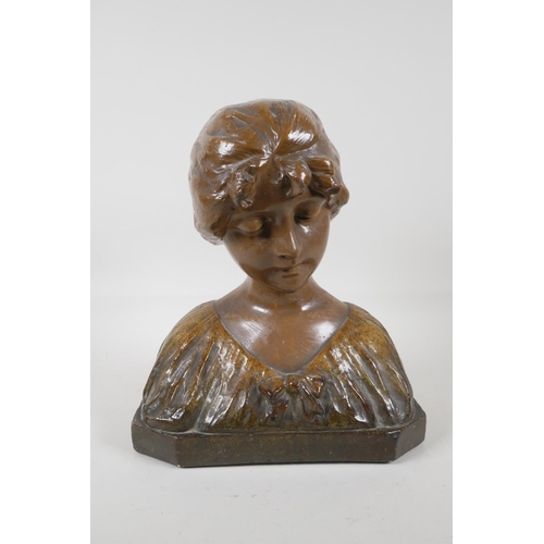 47 - A glazed terracotta bust of a girl in a shawl, 12 high