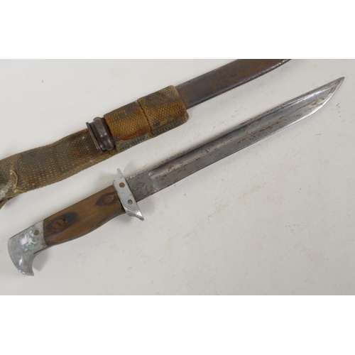 54 - A Japanese military dagger in metal and webbing scabbard bears Tokyo foundry mark, 14½