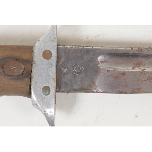 54 - A Japanese military dagger in metal and webbing scabbard bears Tokyo foundry mark, 14½