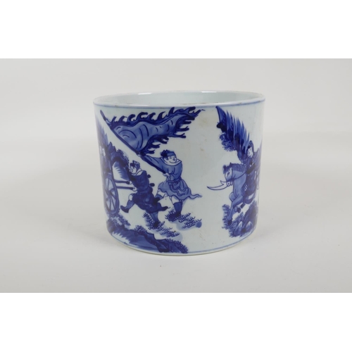 55 - A Chinese blue and white porcelain brush pot decorated with travellers in a landscape, 6 character K... 