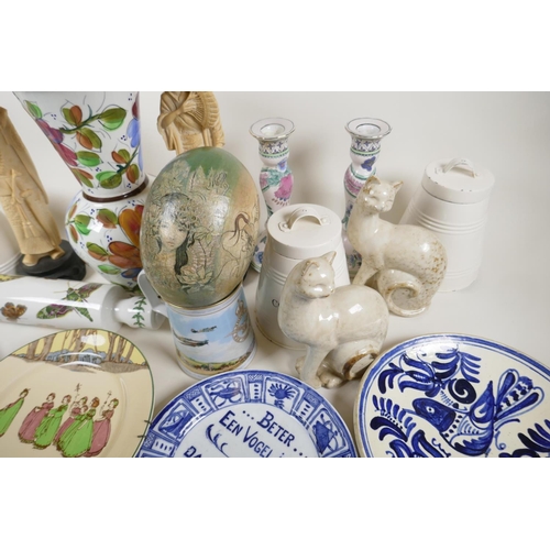 56 - A quantity of pottery and porcelain including Portmeirion rolling pin, Worcester 'Flat Mates' cat, D... 