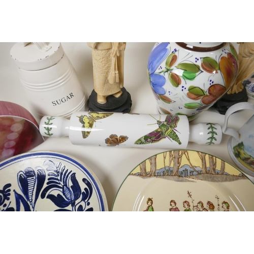 56 - A quantity of pottery and porcelain including Portmeirion rolling pin, Worcester 'Flat Mates' cat, D... 