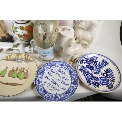 56 - A quantity of pottery and porcelain including Portmeirion rolling pin, Worcester 'Flat Mates' cat, D... 