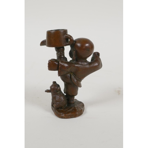 58 - A Japanese bronze okimono in the form of a child practising martial arts, 3