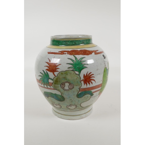 60 - A Chinese Wucai porcelain jar decorated with women and children in a garden, 8½