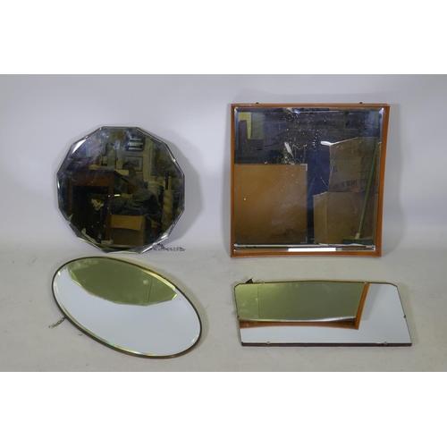 1161 - A mid-century teak framed mirror, a brass framed oval mirror, and two others, largest 24