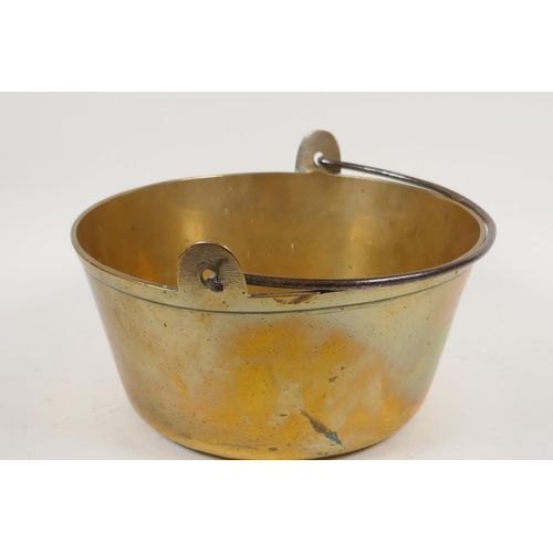 1 - A C19th brass jam pan with iron swing handle, 10