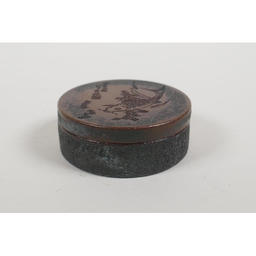 10 - A Chinese bronze cylinder ink well/box with carp decoration to the cover and Yin Yang shaped wells t... 