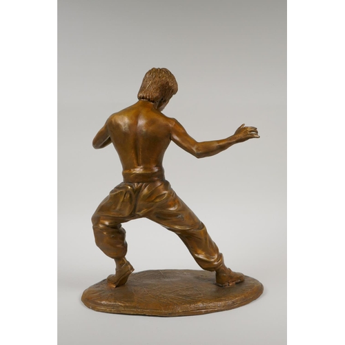 13 - A bronze figure of Bruce Lee, 13½