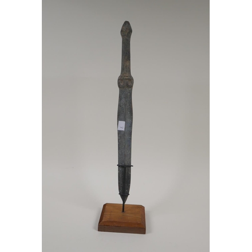 18 - A Chinese bronze archaic style dagger, on a display stand, 16