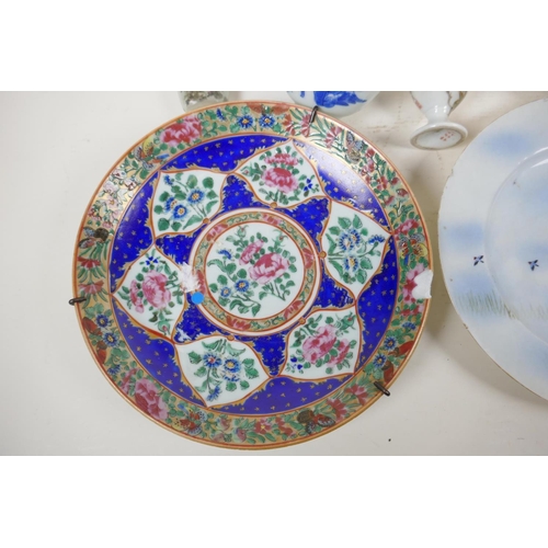 2 - Oriental porcelain to include a Chinese blue and white rice bowl, Chinese tea cup, famille rose plat... 