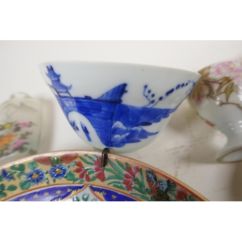 2 - Oriental porcelain to include a Chinese blue and white rice bowl, Chinese tea cup, famille rose plat... 