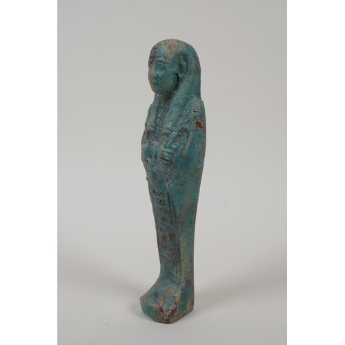 30 - An Egyptian turquoise glazed faience shabti, 6½