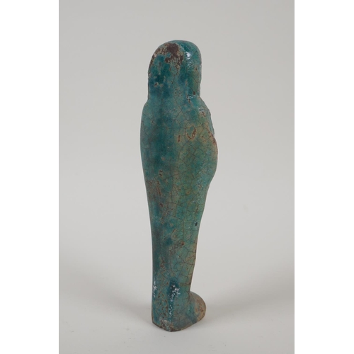 30 - An Egyptian turquoise glazed faience shabti, 6½