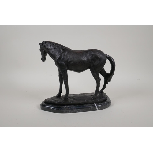 32 - A bronze figure of a horse, on a marble base, 8½