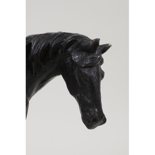 32 - A bronze figure of a horse, on a marble base, 8½