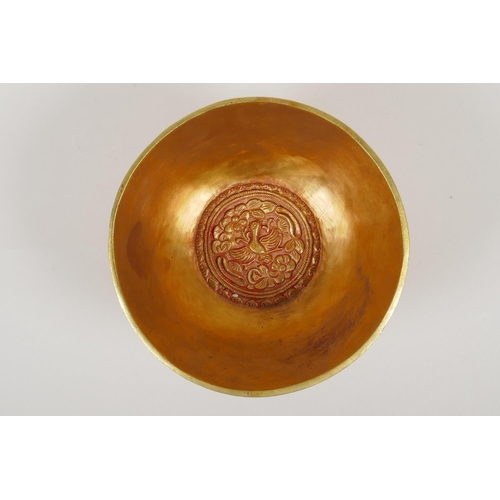 43 - A Chinese gilt metal bowl with raised decoration of the '100 boys', 4 character mark to base, 5