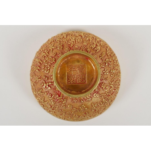 43 - A Chinese gilt metal bowl with raised decoration of the '100 boys', 4 character mark to base, 5