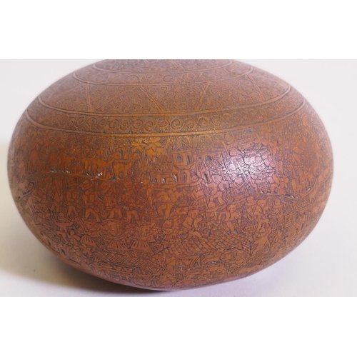 44 - An antique gourd with exceptionally fine engraved decoration, depicting village scenes and farmers t... 