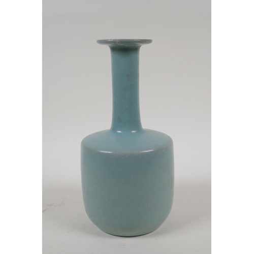 45 - A Chinese Ru ware style vase with slender neck and character inscription to side, 10