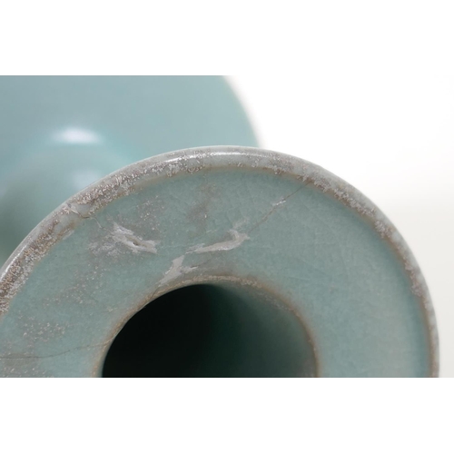 45 - A Chinese Ru ware style vase with slender neck and character inscription to side, 10