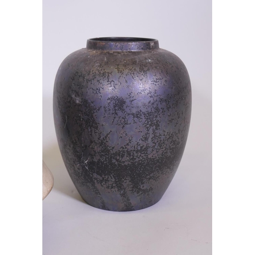 49 - A Poole Pottery Calypso black lustre glazed vase, 8