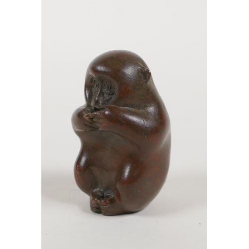 5 - A Japanese bronze okimono incense stick holder in the form of a monkey, impressed mark to base, 1&fr... 