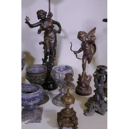 51 - A quantity of metalware, metal lamps, urns and candle sticks and stick stand, 23