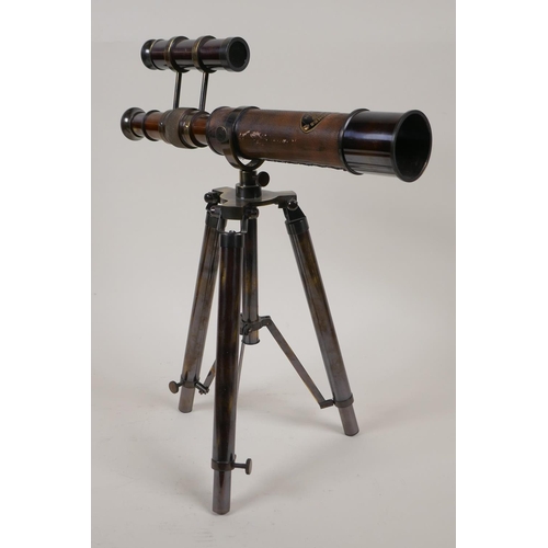 56 - A brass table top telescope on extending tripod stand, 11