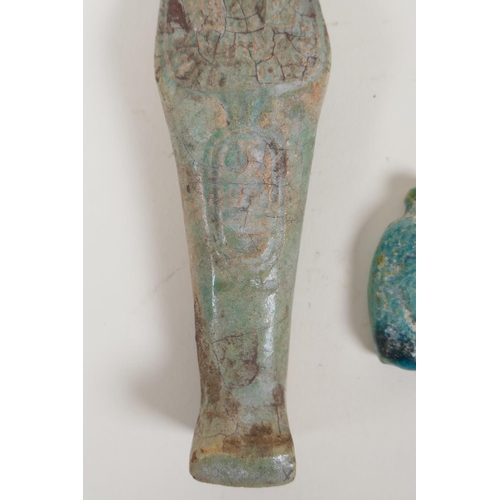 58 - An Egyptian turquoise glazed faience horus shabti and a turquoise glazed pottery head bust token, la... 