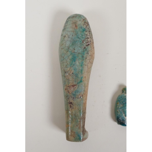 58 - An Egyptian turquoise glazed faience horus shabti and a turquoise glazed pottery head bust token, la... 