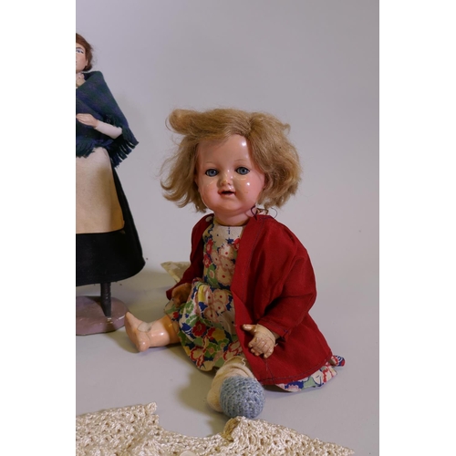 9 - A K&B celluloid head doll, with rolling eyes, marked 1728/4, another, unmarked and a hand painte... 