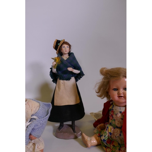 9 - A K&B celluloid head doll, with rolling eyes, marked 1728/4, another, unmarked and a hand painte... 