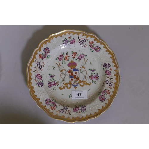 17 - A near pair of Chinese export armorial plates with bianco sopra bianco and gilt and enamel decoratio... 