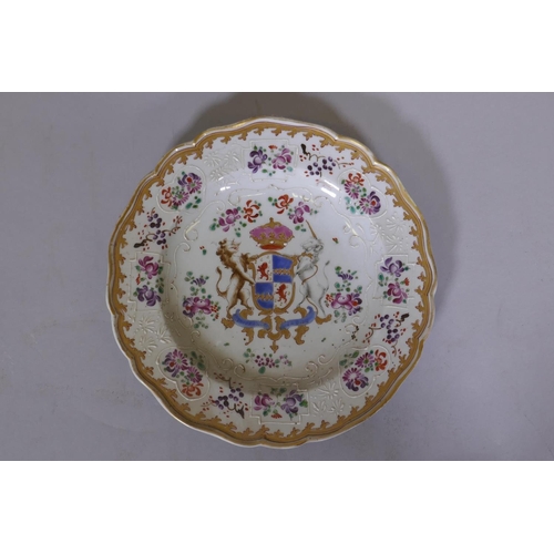 2 - A pair of Chinese export armorial plates with bianco sopra bianco and gilt and enamel decoration, 9