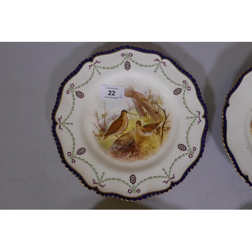 22 - Four Royal Worcester cabinet plates, decorated with game birds, 9