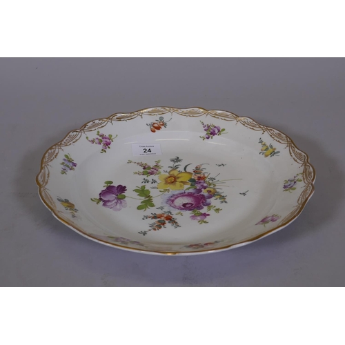 24 - A Meissen shallow bowl with gilt borders and hand painted floral spray decoration, 12