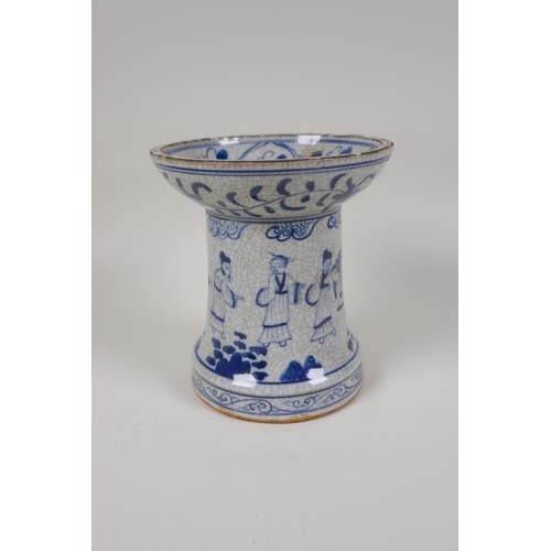 38 - A Chinese crackleware censer/taper holder with blue and white decoration of figures in a garden, 4 c... 