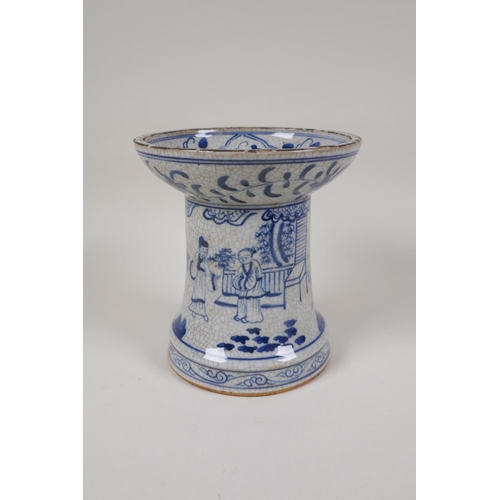 38 - A Chinese crackleware censer/taper holder with blue and white decoration of figures in a garden, 4 c... 