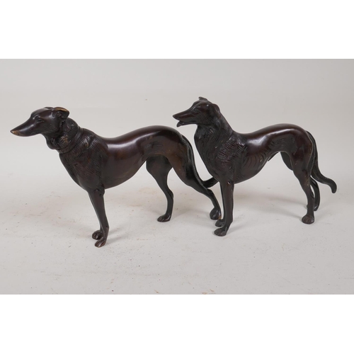 39 - A pair of bronze figures of hounds, 6½