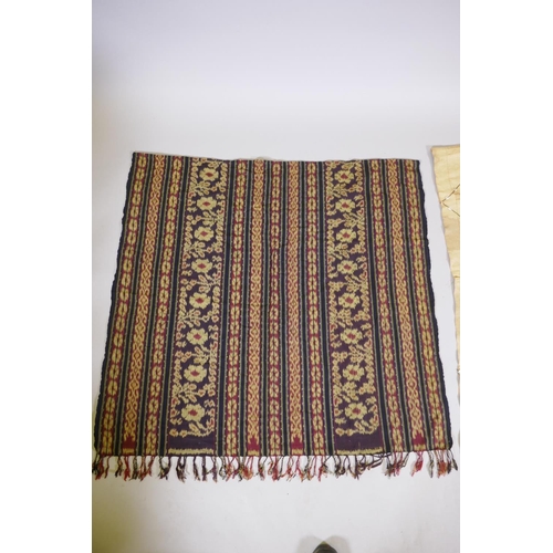 45 - An Indonesian woven batik style wall hanging, 46