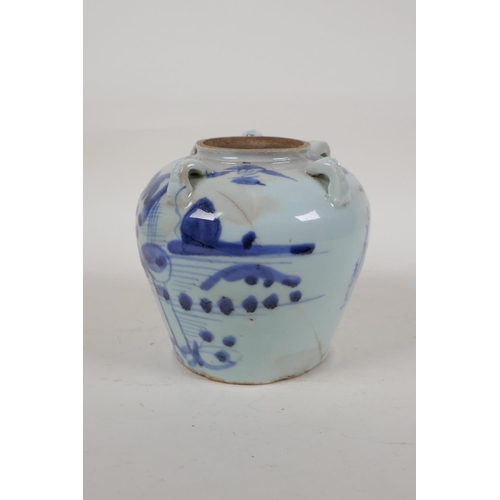 50 - A Chinese blue and white porcelain wine jar with four lug handles, decorated with a landscape, inscr... 