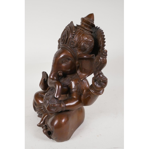 51 - A cast bronze figure of Lord Ganesh, 12