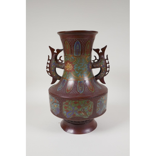 53 - A Japanese coppered bronze two handled vase of archaic design, with cloisonne panelled decoration of... 