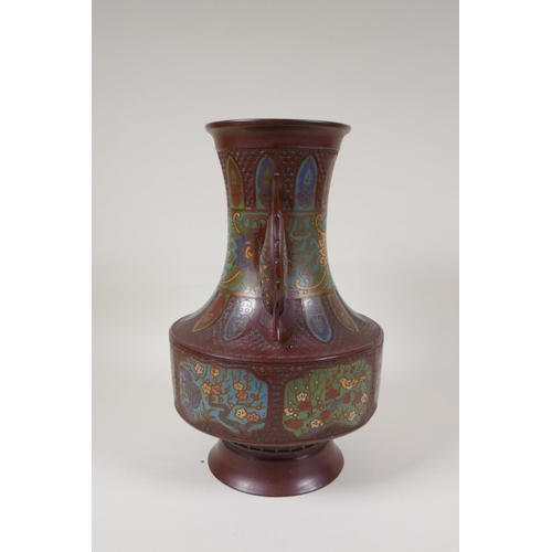 53 - A Japanese coppered bronze two handled vase of archaic design, with cloisonne panelled decoration of... 