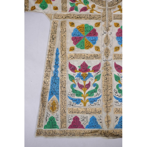 56 - An Islamic linen robe with all over hand painted calligraphy decoration 41