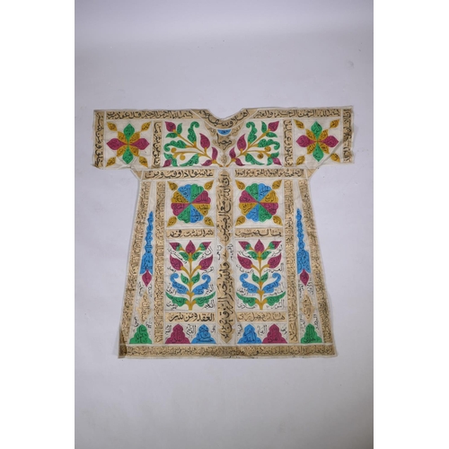 56 - An Islamic linen robe with all over hand painted calligraphy decoration 41