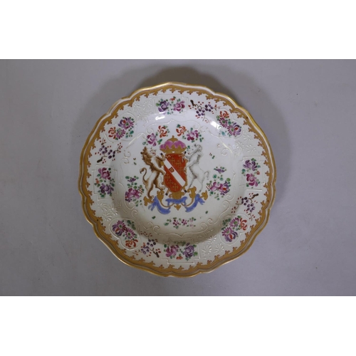 6 - A pair of Chinese export armorial plates with bianco sopra bianco and gilt and enamel decoration, 9