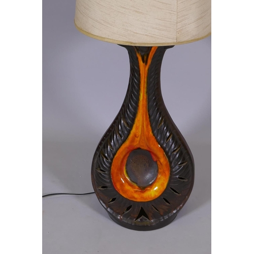 60 - A mid C20th ceramic table lamp with tall shade, 56½